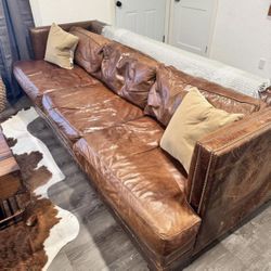 Restoration Hardware RH Leather sofa needs work! Smells, distressed rustic couch beautiful