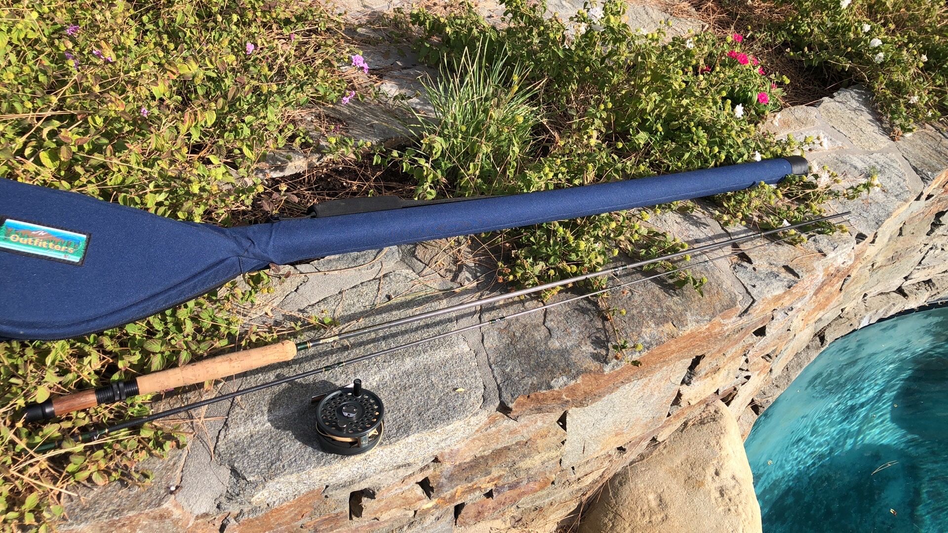 Fenwick Eagle Graphite E90-6F 9’0” Six weight fly Rod with Lamson DCA-2 Fly Reel plus Outfitter’s fly rod case.