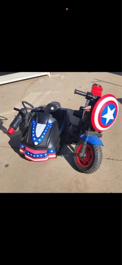 child motorcycle with side car. charger included