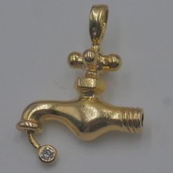   14kt yellow gold "faucet " pendant 4.4 grams w 1 diamond. pre owned. 877515-1. 