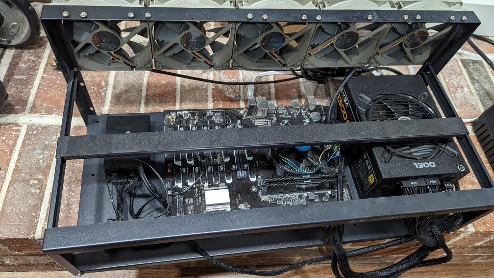 Asus B250 Mining Expert Rig, Pentium CPU, Corsair RAM, SSD, EVGA 1300 PSU, Noctua Fans