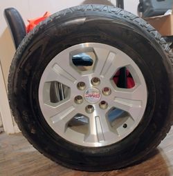 18 in GMC 1500 series rim/tire