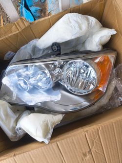 Driver side headlight 2012 Town and country van