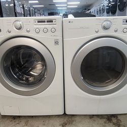 LG Front Loading Washer And Stackable Gas Dryer Set 