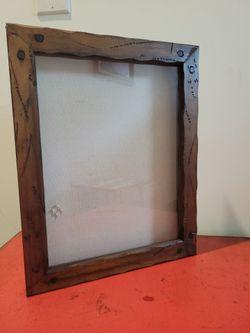 Shadow box with pins
