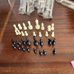 Small Plastic Chess Pieces. 
