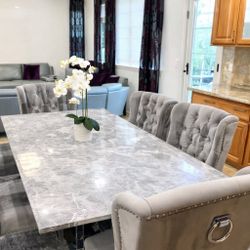 Dining Table With Six Chairs And A Set Of Leather Sofa Seats