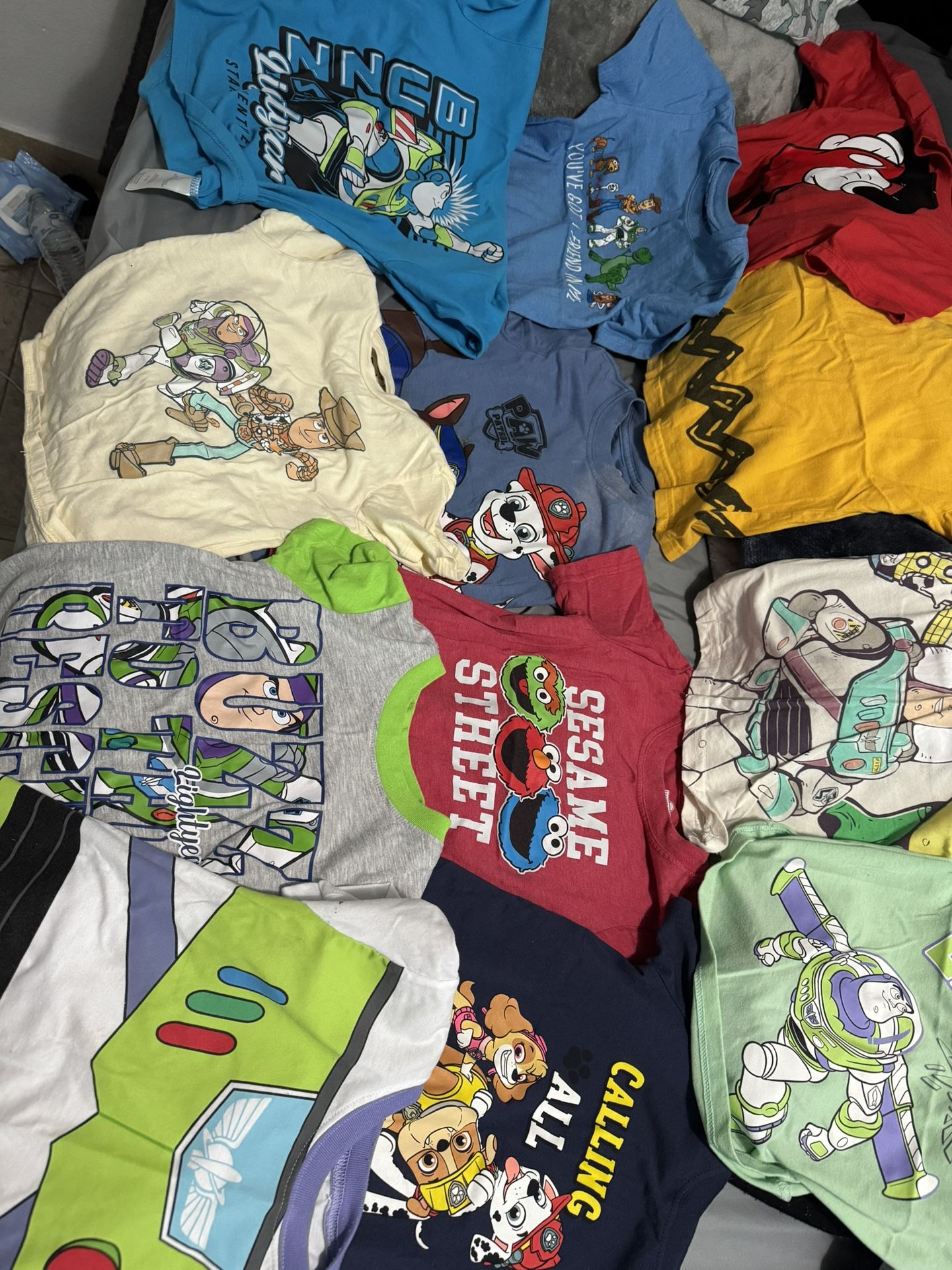 13 Shirts 1 Shorts 4T $8 ( Firm Price )