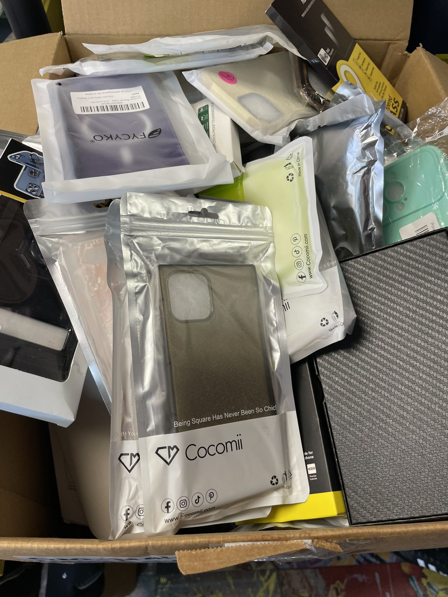 Box of Phone Cases & Accessories