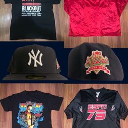 Assorted Clothing Brand New (Yankees, NJ Devils, NYC Blackout, The Rock Wrestling) Tees, Jacket, Fitted, Jersey- $0