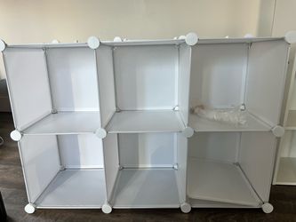 Two 6 cube storage shelves