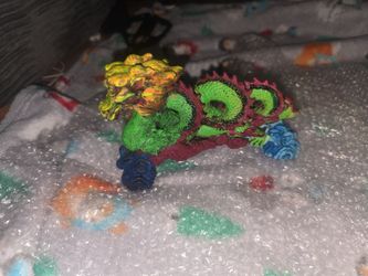 Colorful Dragon Figurine with Wheels