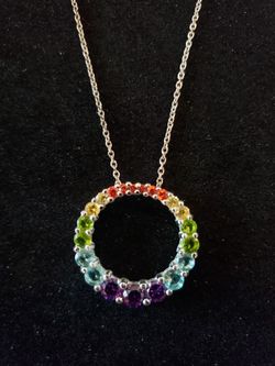 $30. STERLING SILVER Rainbow CZ circle pendant and necklace. Pendant is 3/4 inch diameter. Necklace is 18 inches.