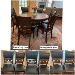 Dining table set with chairs and a rug for sale