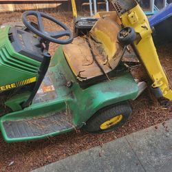 John Dear Ride On Lawn Mower With Blades And Wagon Its A Value Of 2300 Give Me A Offer Ride It Home ..