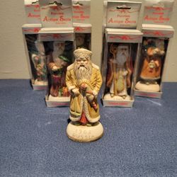 Set Of 7 Porcelain Antique Santa Collectibles 