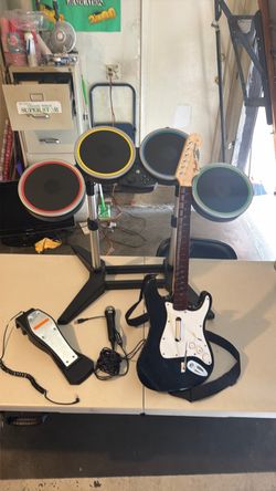 Nintendo Wii Rock Band Setup with Guitar, Drums , Foot pedal and mic
