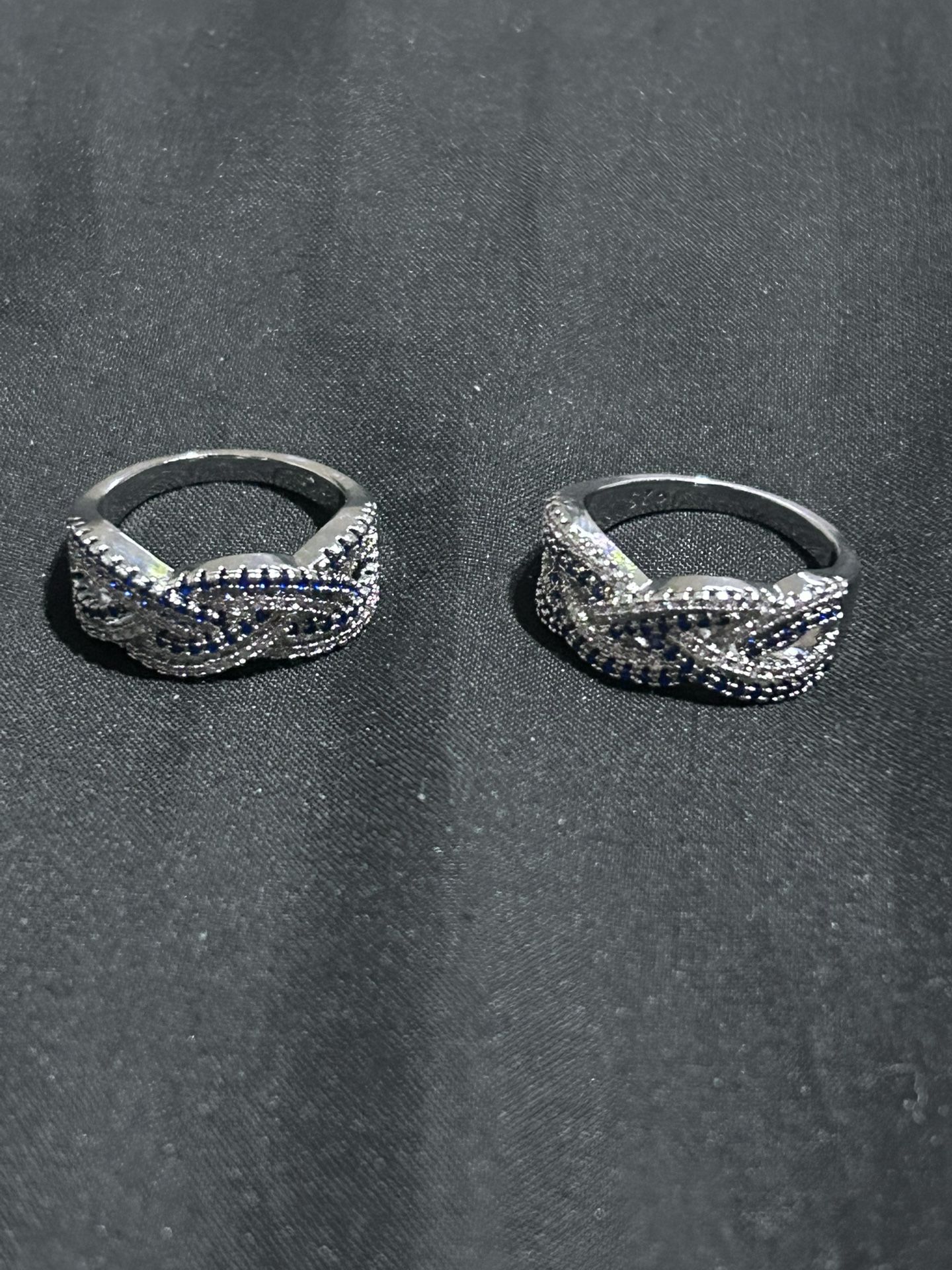 Sterling Silver Crossover Ring - Blue And Black CZ