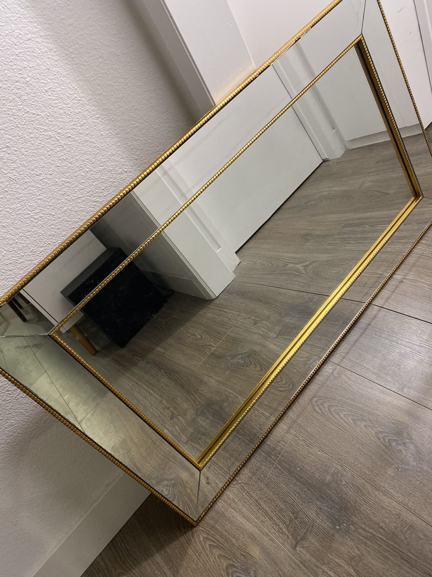 Gold frame wall mirror