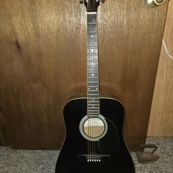 Córdoba black  acoustic guitar.