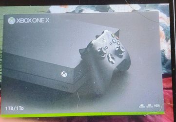 Xbox One X like New. With Custom Skin. With Box.