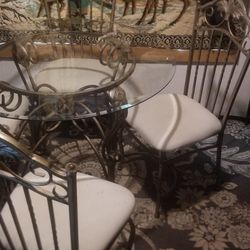 Ornate Metal And Glass Table And 4 Chairs