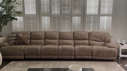 Reclining leather sofa