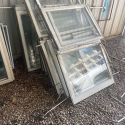Bundle Of White Wooden Window Sashes 
