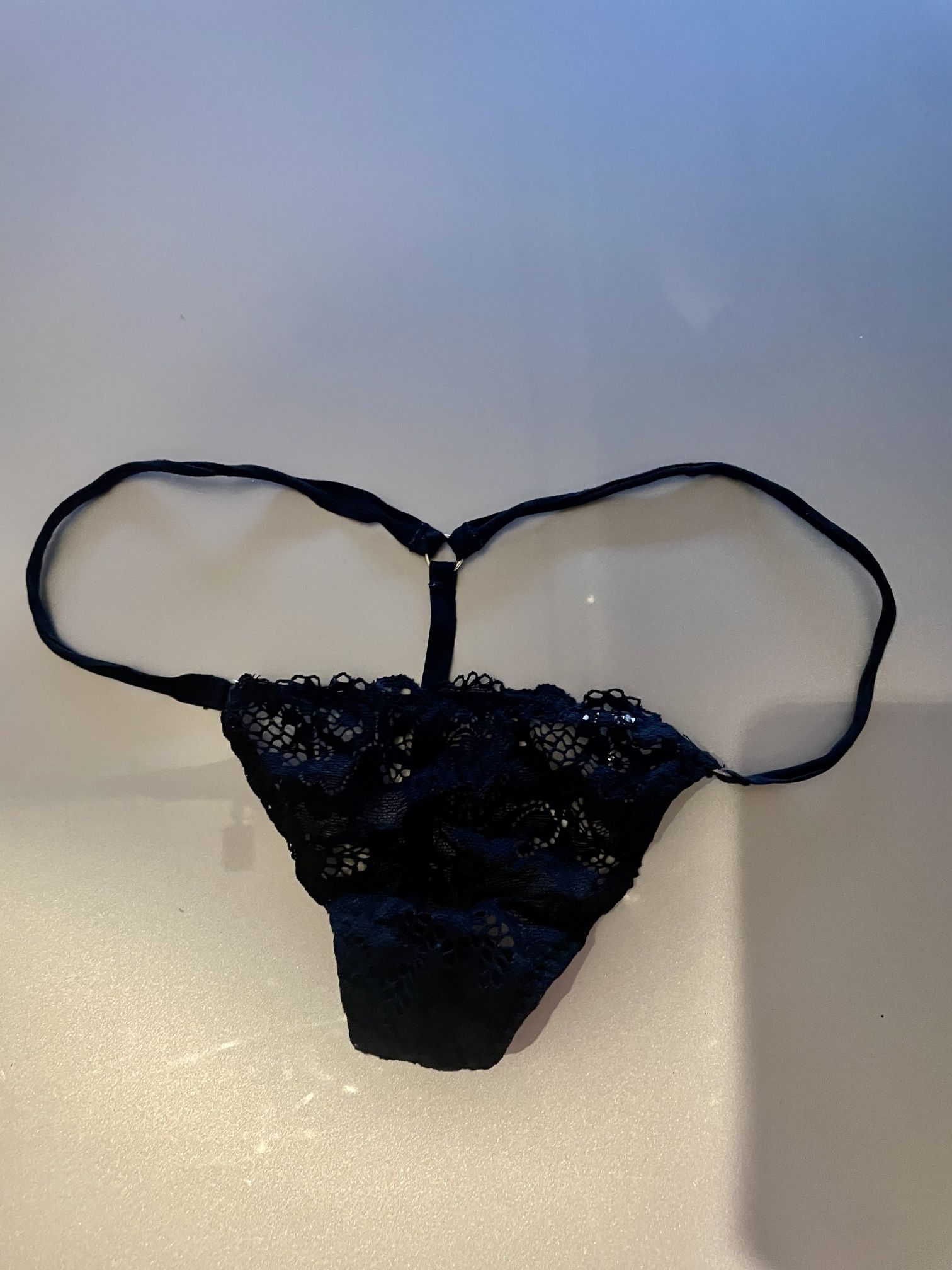 Black Lace Micro-Thong — A Study in Sensual Simplicity