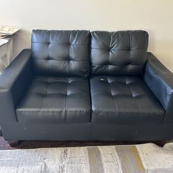 Black leather Loveseat 