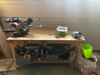 Free rolling work table with saw