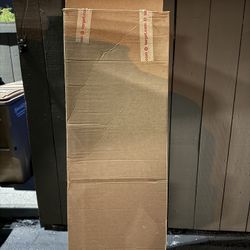 Sturdy, tall, flat cardboard box, about 5.5 feet x 2 feet x 6 inches.