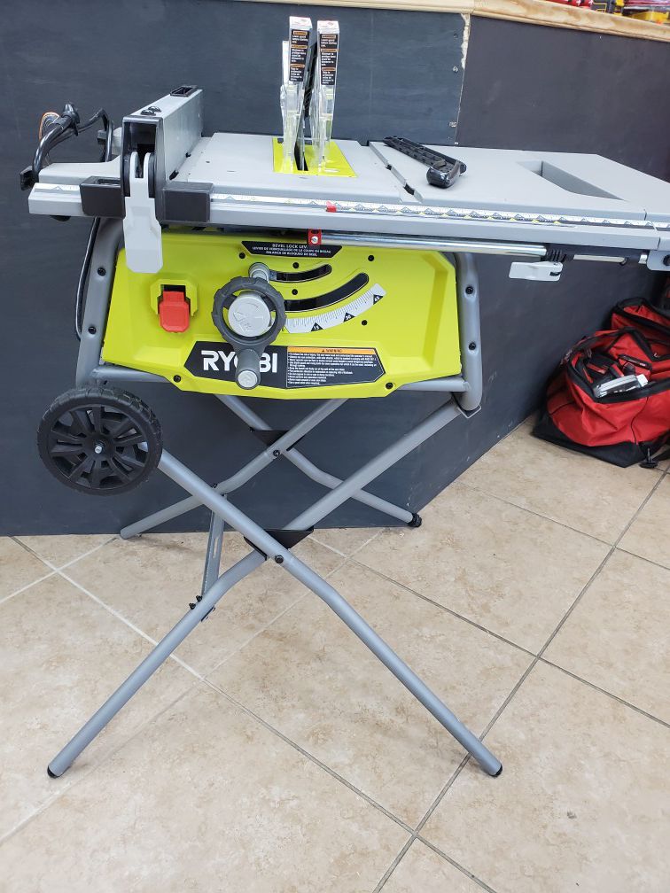 Ryobi tables saw with rolling stand like new 100$!!!