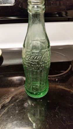Old coke bottles fl stamped make offer
