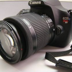 Canon Rebel T5 Camera, comes with Charger and Lens Cap 