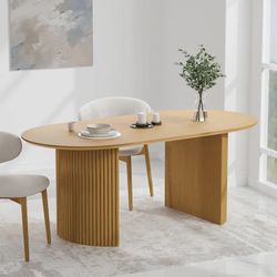 Oak dining table with fluted pedestal base