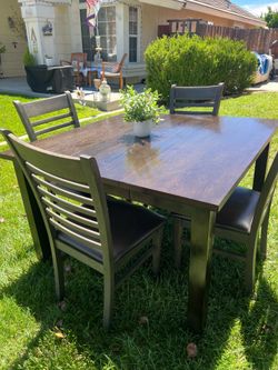 Table & 4 Leather Chairs