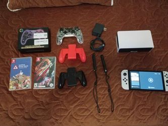 Nintendo switch oled (with box) with 128 gb sd card (price negotiable)