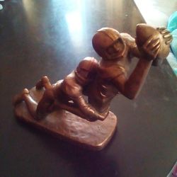 Bronze football statue