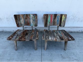 Pair of reclaimed wood lounge chairs.
