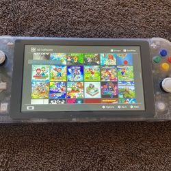NINTENDO SWITCH LITE with 100 SWITCH GAMES MARIO KART,MARIO PARTY,MARIO GALAXY,POKEMON Z-A,ZELDA and More