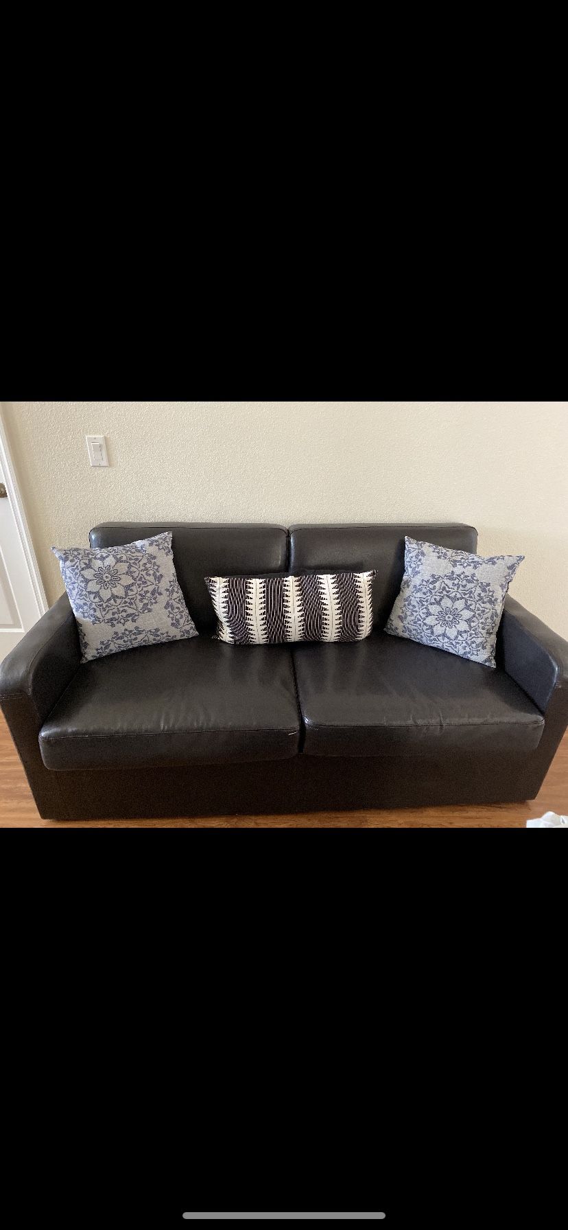 Loveseat can turn in full size bed pillows not included.Good condition