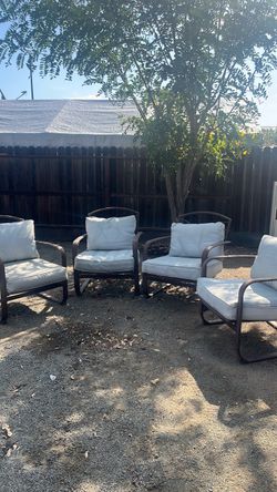 4 piece outside  brown chairs