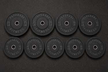 Brand new Olympic size weight plates  two 25 pound and eight 10 pound