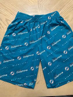 Miami Dolphins mesh shorts covered in an all-over team logo print