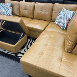 Orange color leather sectional sofa with ottoman