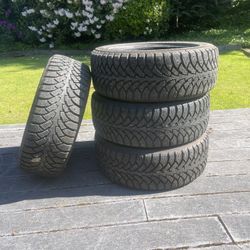 4 used 205/55R16 studded tires pick up only snow tires 