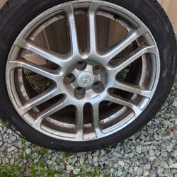 Zion TC Rim and 4 Used Tires