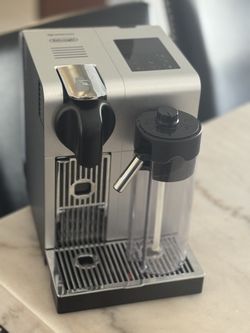 DeLonghi Nespresso coffee machine with milk frother. Nespresso Gran Lattissima Black Coffee Maker