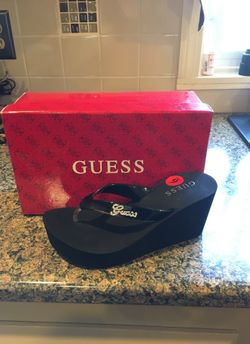 Brand new Guess wedge flip flops size 6 women’s